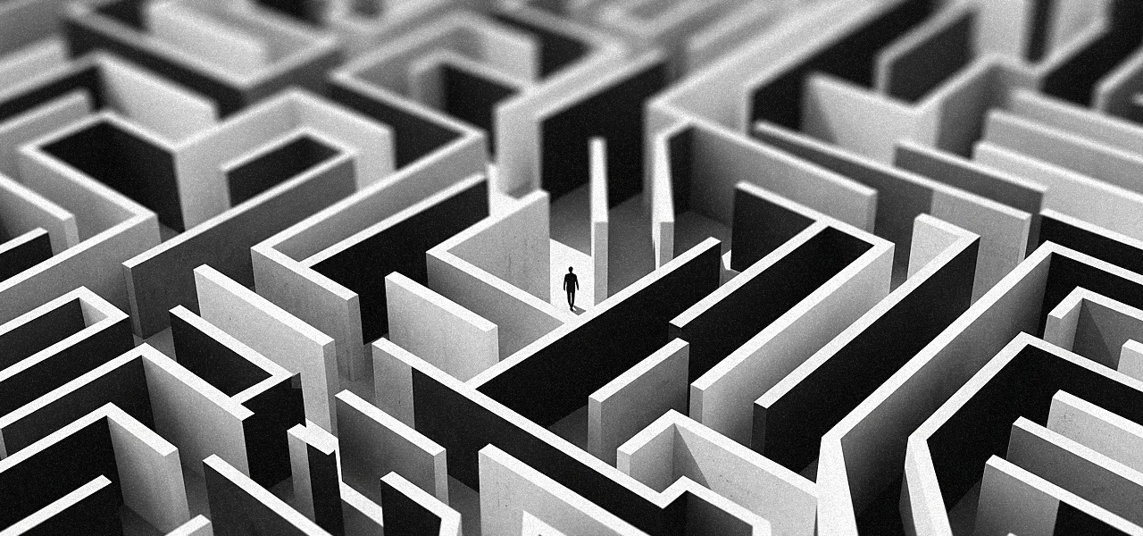 Illustration of a lone person walking through a maze, representing user hesitation caused by complex product design.